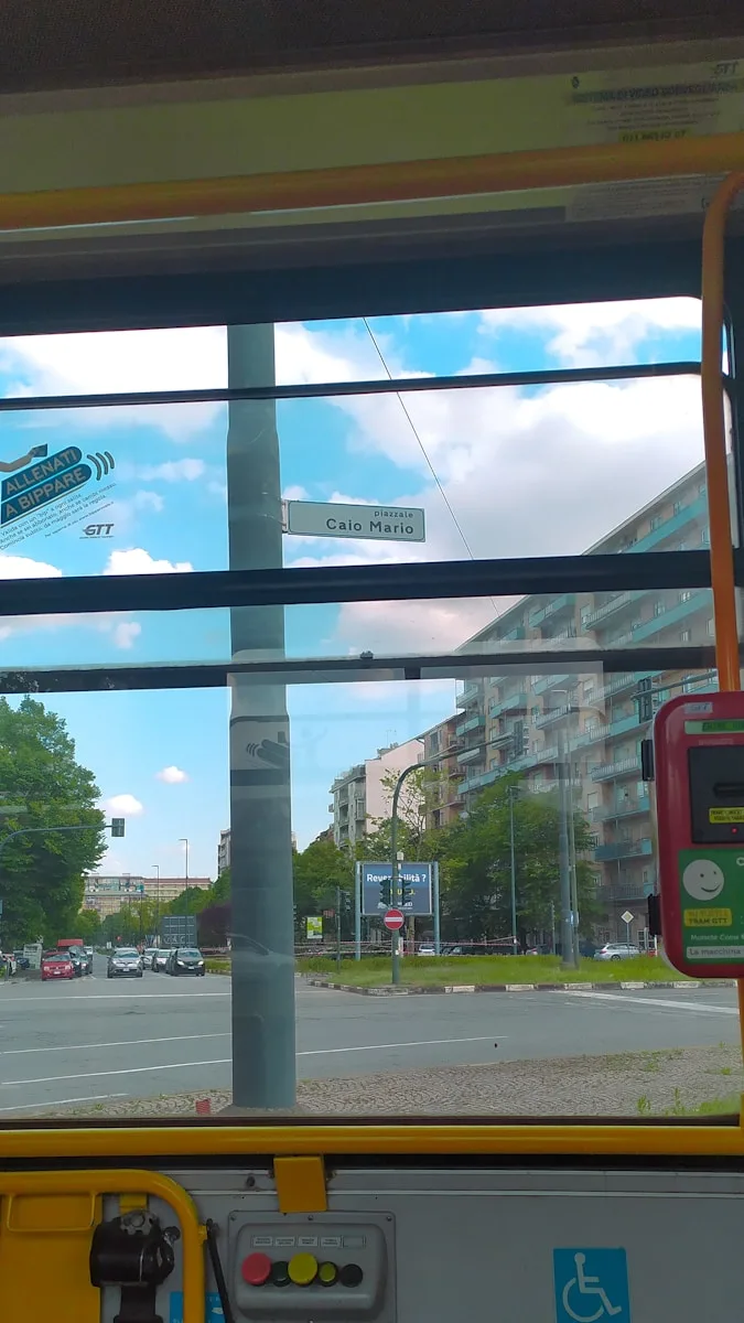 a view of a street from inside a bus