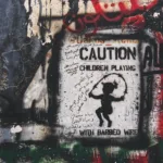 caution children playing graffiti