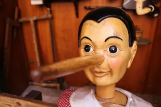 selective focus photography of Pinocchio puppet